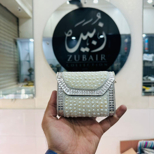 Beautiful Silver pearl clutch